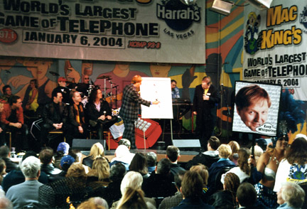 Photo of Mac King on stage